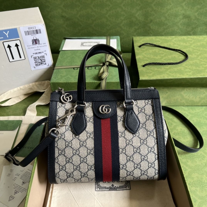 G*u*i shopping bags